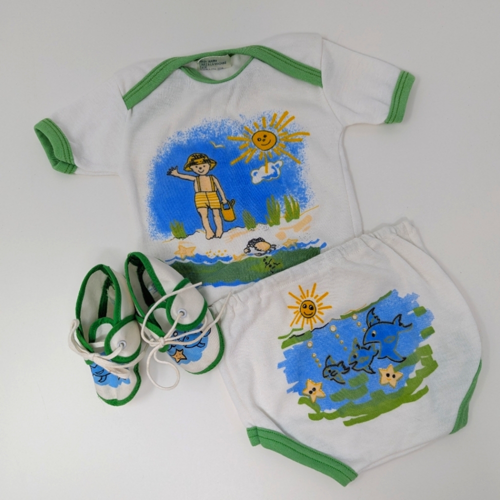 Vintage Baby Clothes Shoes Beach Ocean Scene